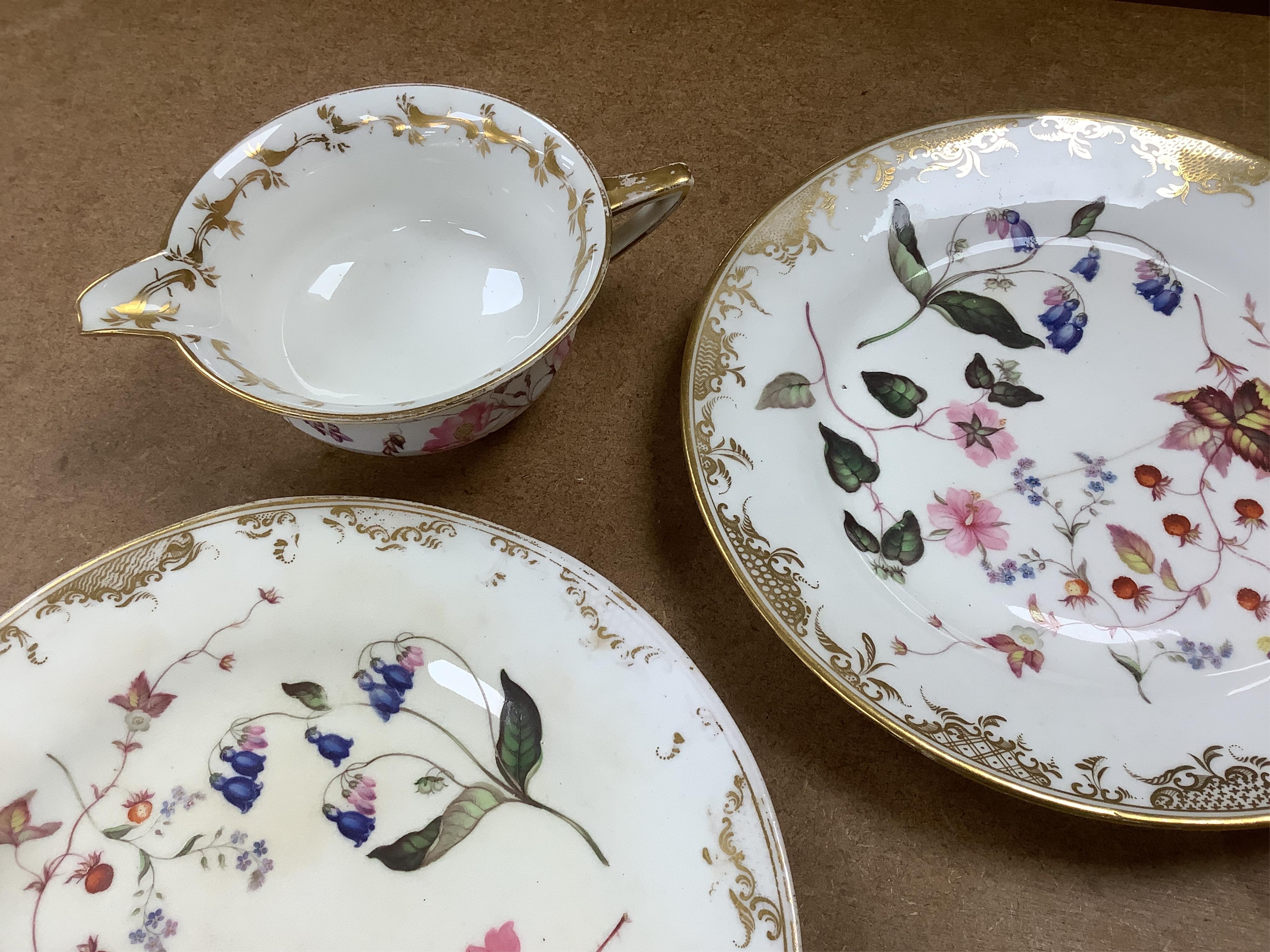 A floral part tea and coffee set, probably Swansea, c.1815-20, largest 23.5cm diameter. Condition - mostly fair